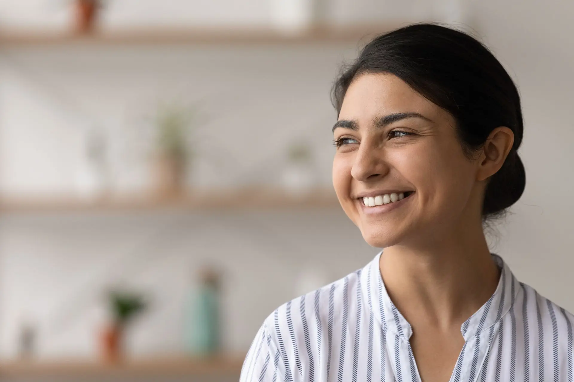 Smiling woman happy with ASuperior Contact Center service